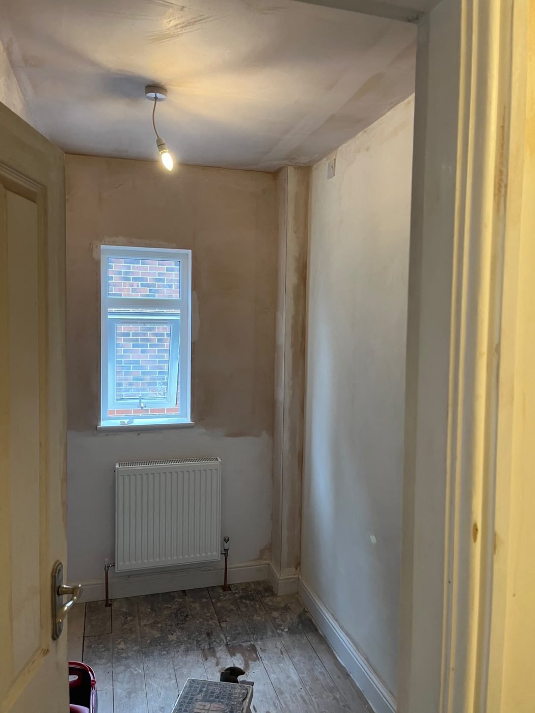 Plastering and making good — Hallway