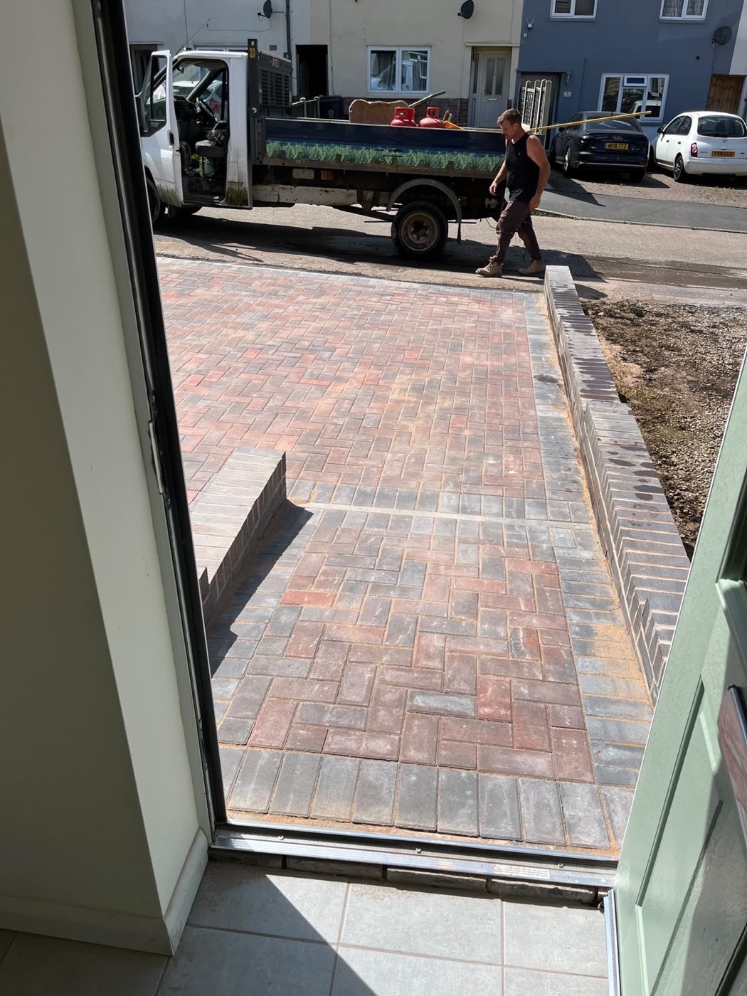 Block paved path and drive laid out from the front door
