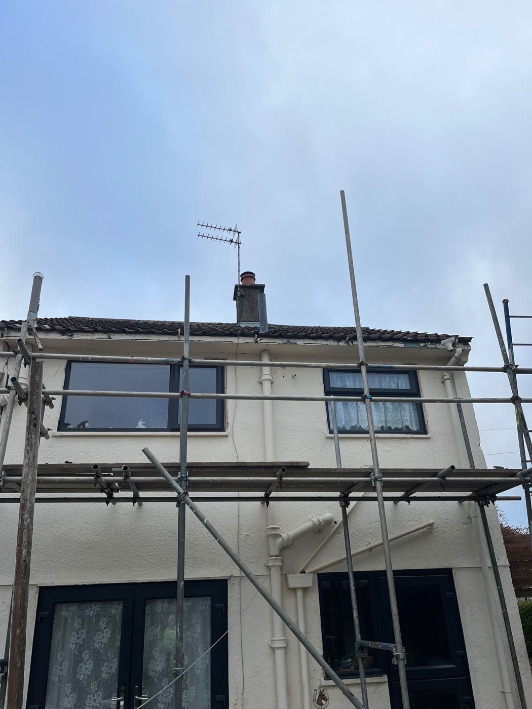 Scaffolded roof works — Rear