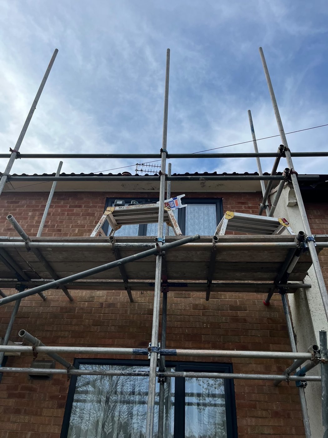 Scaffolded roof works — Side